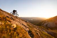 A person mountain biking
