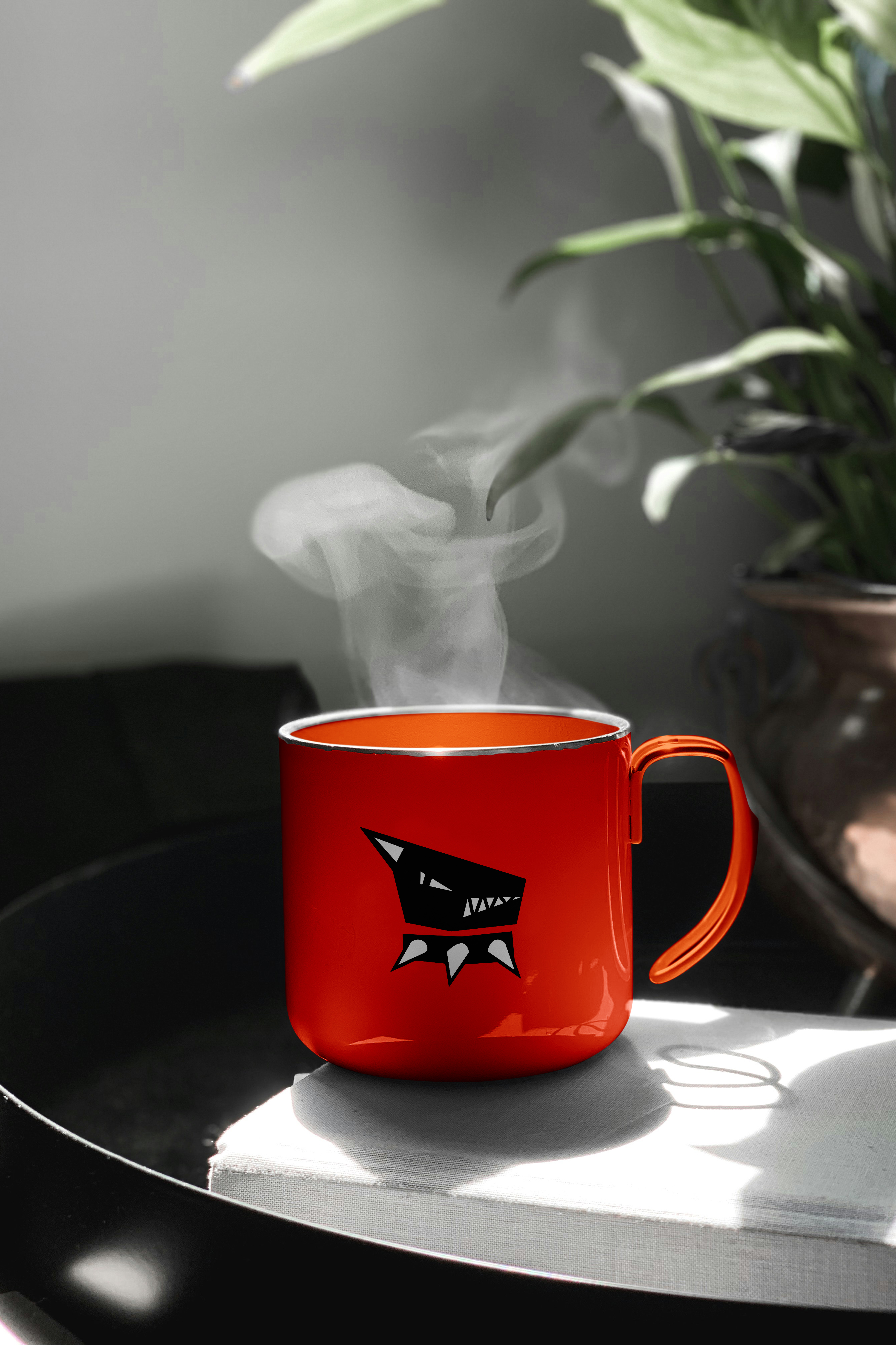 Steam rising from an orange Rude Brew mug in the afternoon sunlight
